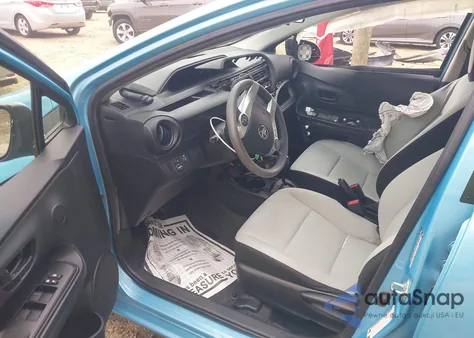 2015 Toyota Prius C One из США, поврежденный, VIN JTDKDTB36F1102816